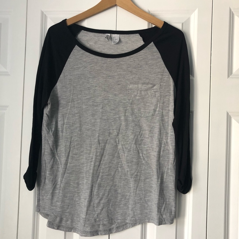 gray and black baseball style shirt